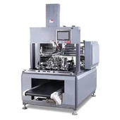 Stroj za tapanje v kotu škatle